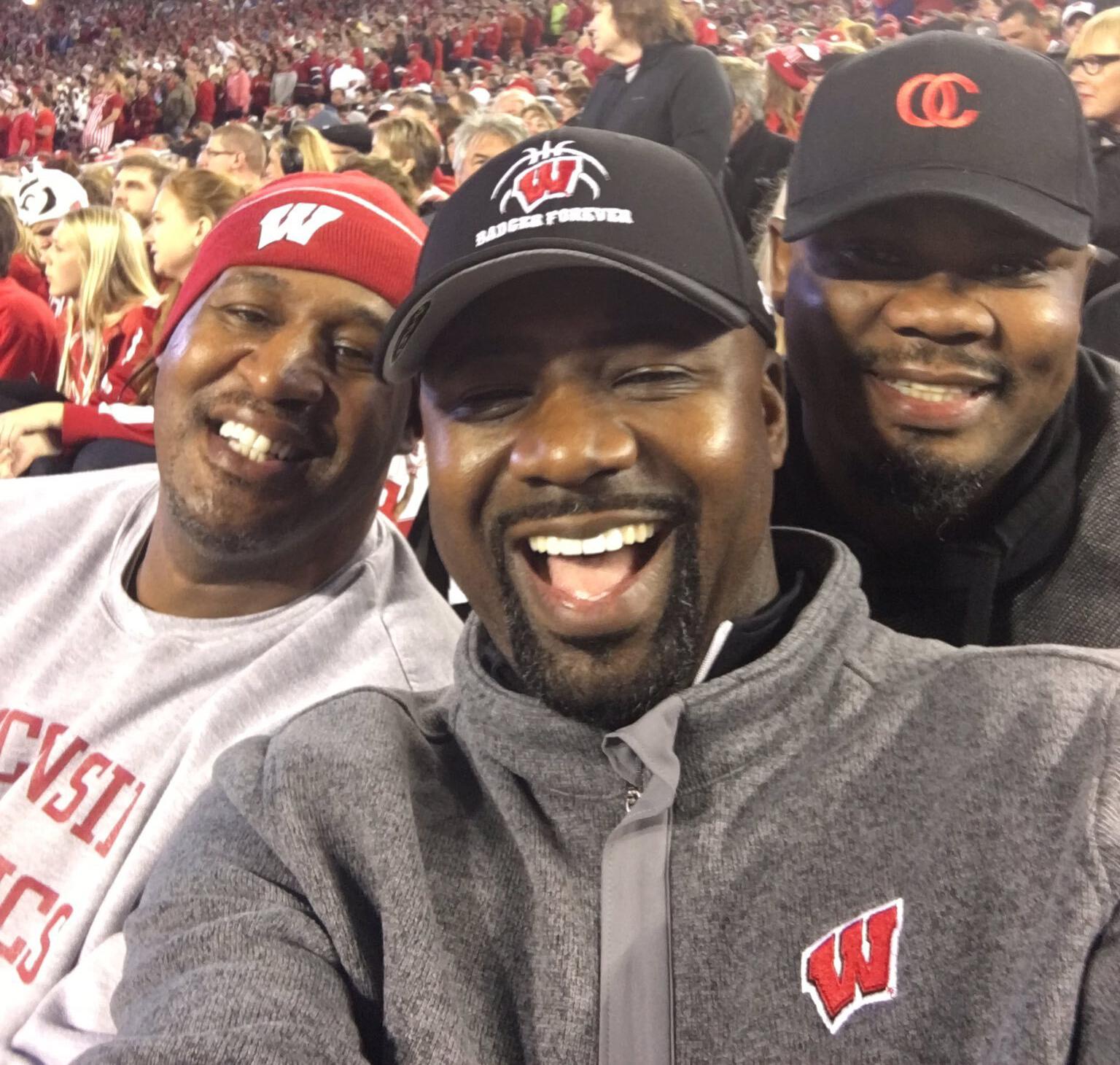 Howard Moore (center), Rashard Griffith (left) and Osita Nwachukwu enjoy a Wisconsin football game together